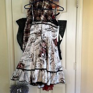 Hot Topic pink rose & music note dress with pockets .